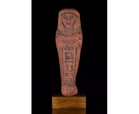 New Kingdom, 19th-20th Dynasty, Ca. 1292-1085 BCA terracotta shabti figure modelled in stylised mummiform pose with hands cro
