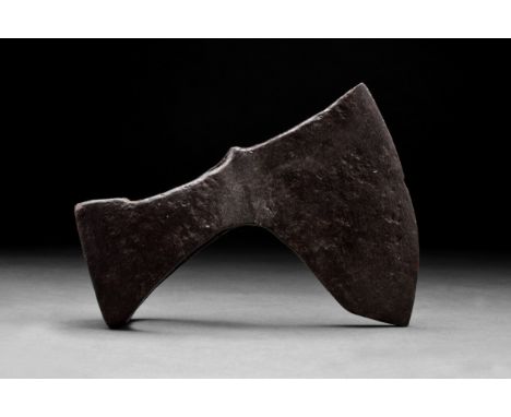 Ca. 900-1000 ADAn iron battle axe with a wide, fan-shaped blade, tapering cheek, heavy poll and a socket. For more informatio