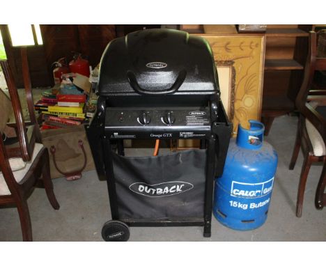 Outback Omega GTX barbecue and almost full bottle of gas, this item is very good condition only used once or twice.