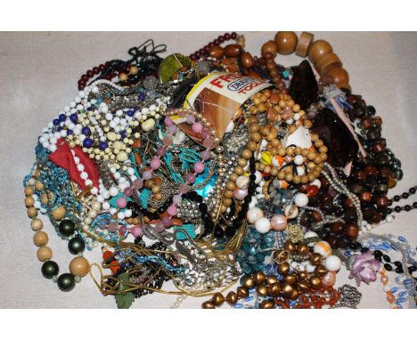 Large box of assorted costume jewellery.