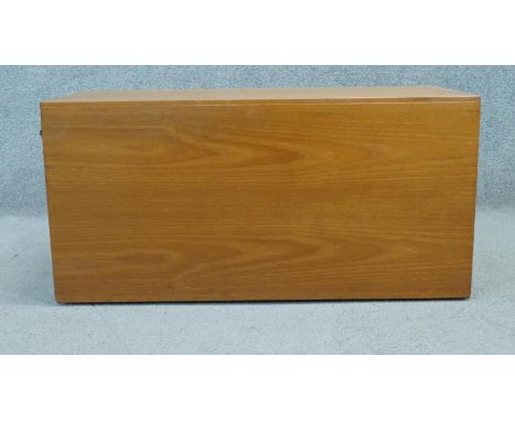 A vintage teak wall mounted cabinet. H.40 W.84 D.40cm (Originally wired with internal light). 