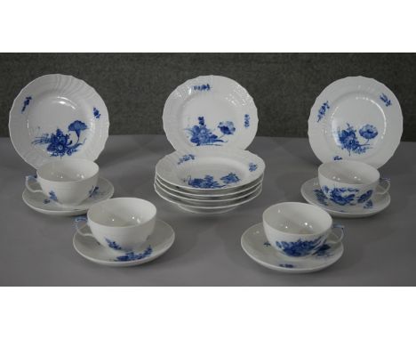 A Royal Copenhagen hand painted porcelain blue and white floral design part four person tea set. Makers mark to the base. (15