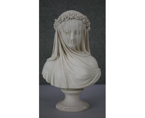 A 19th century Copeland Parian bust of 'The Veiled Bride', modelled by Raffaele Monti, her head slightly bowed, the diaphanou