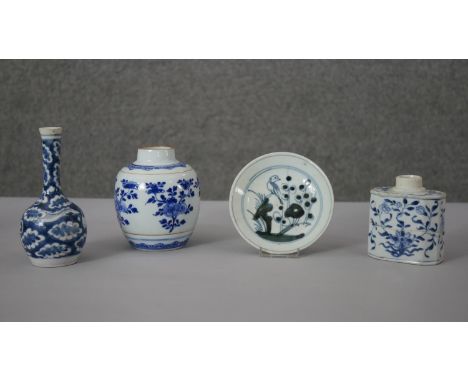 A collection of Qing period Chinese blue and white porcelain. Including a hexagonal tea caddy, a dragon bottle vase, a ginger