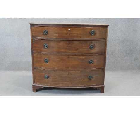 A 19th century mahogany bow fronted chest of drawers on bracket feet. H.101 W.108 D.54 cm 