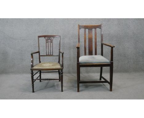 A 19th century mahogany armchair with tapestry seat along with a later oak example. 