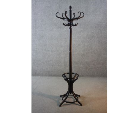 A bentwood coat and umbrella stand. H.187 W.60 cm. 
