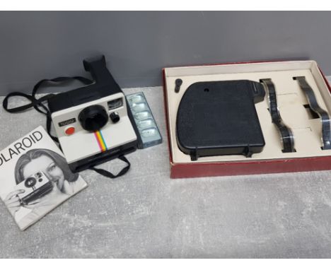 Vintage Polaroid 1000 land camera and the bell home cine de luxe model projector both boxed in good condition