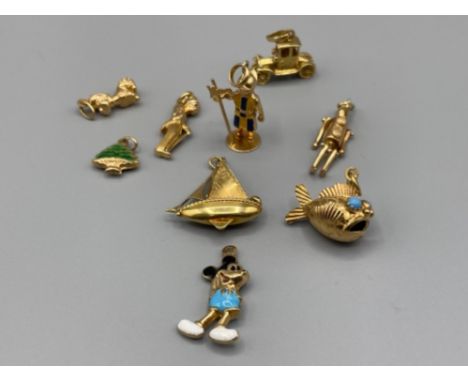 Collection of vintage 18ct gold charms/pendant 9 in total 33.6g