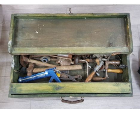 Wooden tool chest containing Misc hand tools, wood cutting axe etc