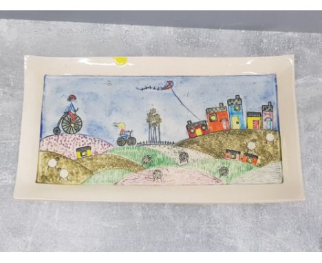 Large colourfully decorated studio pottery tray by yvonne Halton