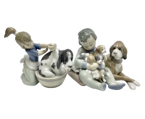 Pair of Lladro figures comprising 'Mis Amigos' model no 5456, and 'Bashful Bather' model no 5455, both with boxes