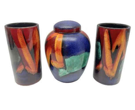 Three pieces of Poole Pottery in Graffiti pattern, comprising Ginger jar and pair of vases, all with impressed mark beneath, 
