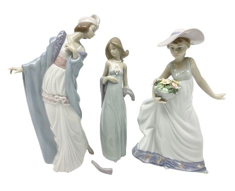 Three Lladro figures of ladies comprising 'The Flirt' model no 5789, 'Ingenue' model no 5487 and 'Carefree' model no 5790, al