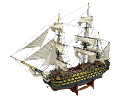 20th century scratch built wooden model of HMS Victory on wooden stand, H75cm, L95cm
