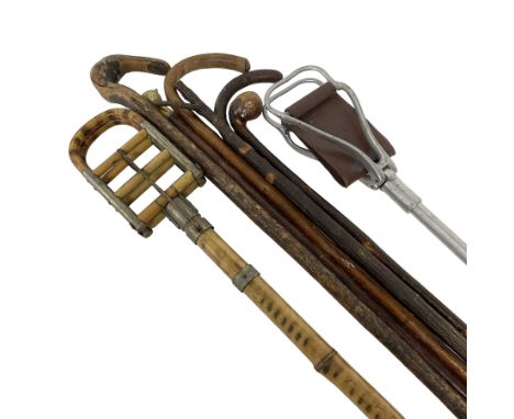 Early 20th century bamboo &amp; metal French shooting stick, the mount stamped Bte. SGDG, together with other various walking