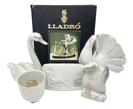 Group of Lladro comprising 'Dove' model no 1016, 'Art Brings us Together' plaque no 7677, Collector's Society plaque and teal