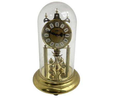 Late-20th century Haller torsion clock - German 400-day clock under an acrylic dome, with a gilt dial Roman numerals and pier