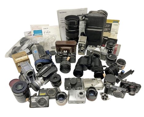 Collection of camera bodies, lenses and equipment, to include Black Rollei B35 Compact Camera body, with 'Triotar 3.5/40' len