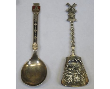 Unhallmarked Dutch silver diorama caddy spoon, plus 925 enamelled silver spoon 