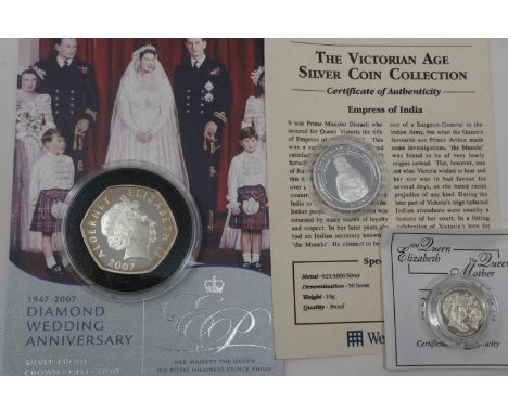 Three silver proof coins, with certificates. P&amp;P Group 0 (£5+VAT for the first lot and £1+VAT for subsequent lots) 