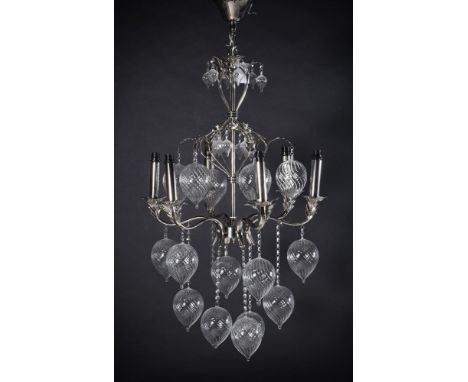 A 'Teardrop' glass hung chandelier. approx. 120cmH overall, 60cmW, please note the light shades pictured in the in-situ photo