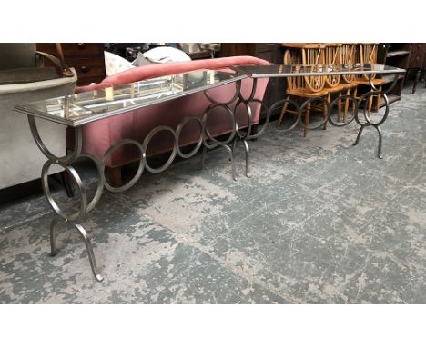Interior design interest: A pair of Jonathan Charles Luxe Collection 'Circles Silver' wrought metal console tables with mirro