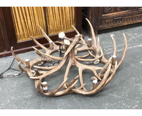 Interior design interest: a contemporary six arm resin antler chandelier, approx. 76cmD 