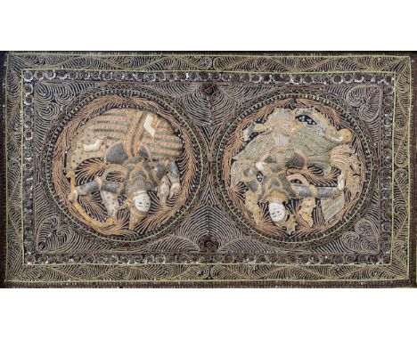 A large 20th century Burmese Kalaga beadwork tapestry panel depicting two figures, one a Garuda, 82x47.5cm 