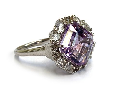 A sterling silver ring set with an Asscher cut Bahia amethyst, 8.1cts, surrounded by white topaz, size R 1/2 