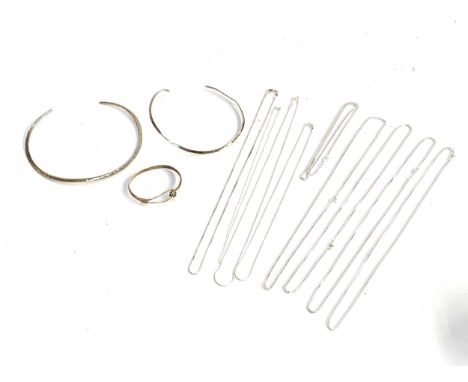 Two 925 silver collars together with a 925 silver bangle, gross weight 44g; together with nine modern white metal chains, som