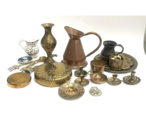 A mixed lot of brass and other metal items to include gongs, vase, pewter tankard, candlestick holders, trays, etc 
