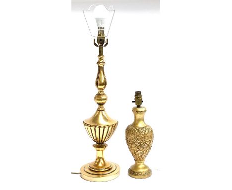 A gilt metal table lamp, 57cmH to top of fitting; together with a smaller gilded table lamp with acanthus detail, 34cmH to to