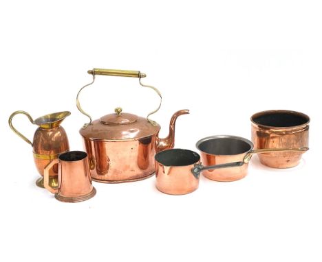 A quantity of copper kitchenalia to include large kettle with stylised brass handle 32cmW; copper tankard; planter etc 