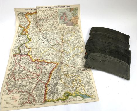 A lot of five German cloth army envelope forage hats, Bamberger Mutzen Industrie, together with a News of the World war map o