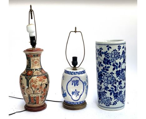 A 20th century Japanese blue and white compressed form lamp; together with a Japanese Imari vase converted into a table lamp 