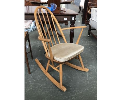 An Ercol style beech and elm rocking chair, 60cmW 