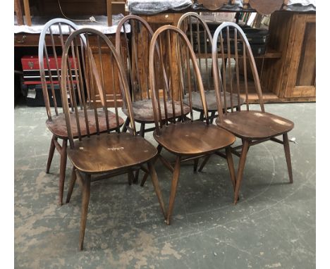 A set of six Ercol Quaker dining chairs (af) in a dark stained finish/painted, model 1960 2056 