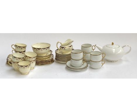 A Plant Tuscan part tea set; together with Austrian teacups and saucers; and a Royal Doulton 'Symmetry Gold' teapot 