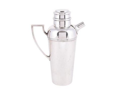 An electro-plated cocktail shaker by Mappin &amp; Webb, the tapering body with a domed cover, harp handle and reeded band, 23