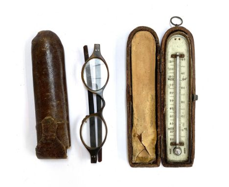 A pair of antique tortoiseshell spectacles (repaired) in leather case; together with a leather cased thermometer 