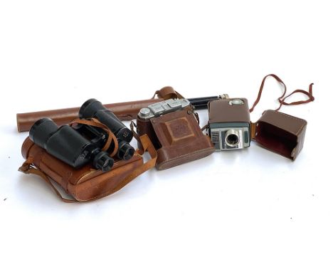 A pair of vintage Omega 7x50 field binoculars in leather case; together with a Kodak Automatic 8 movie camera; Mamiya 6 camer