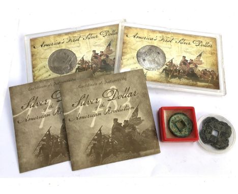 Two American 1783 Eight Reale 'first silver dollar' coins, discovered in the remains of a Spanish brig of war off the coast o