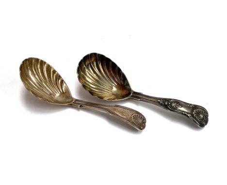 A William IV King's pattern silver caddy spoon, maker's mark MC; together with a further Victorian King's Pattern caddy spoon