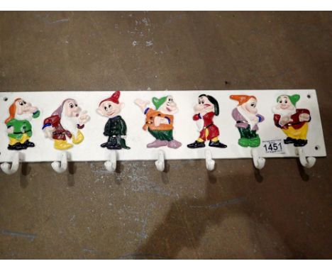Cast iron Seven Dwarves coat hanger, L: 60 cm. UK P&amp;P Group 2 (£20+VAT for the first lot and £4+VAT for subsequent lots) 