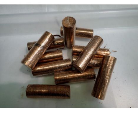Twelve unopened rolls of uncirculated halfpennies, fifty pieces to each roll. UK P&amp;P Group 1 (£16+VAT for the first lot a