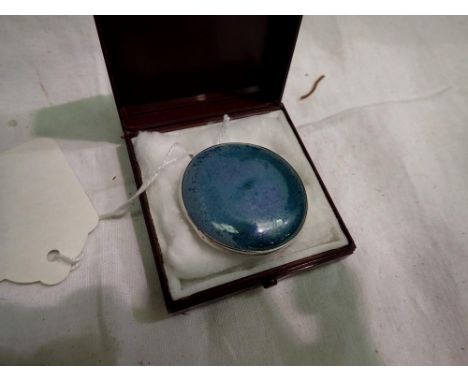 Turquoise ceramic and silver brooch by Ruskin, stamped to rear, D: 40 mm. UK P&amp;P Group 1 (£16+VAT for the first lot and £