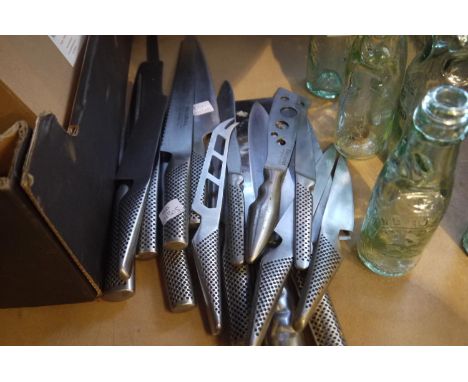 Set of Global kitchen knives and two others, four with slight damage, RRP £800+. UK P&amp;P Group 1 (£16+VAT for the first lo