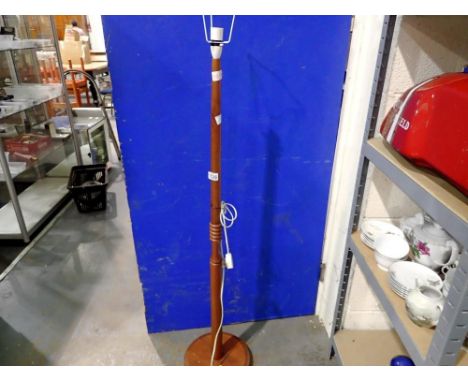 Standard lamp with turned stem, H: 150 cm. All electrical items in this lot have been PAT tested for safety and have passed. 