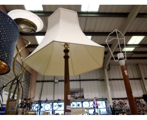Oak standard lamp on a circular base with shade, overall H: 170 cm. All electrical items in this lot have been PAT tested for
